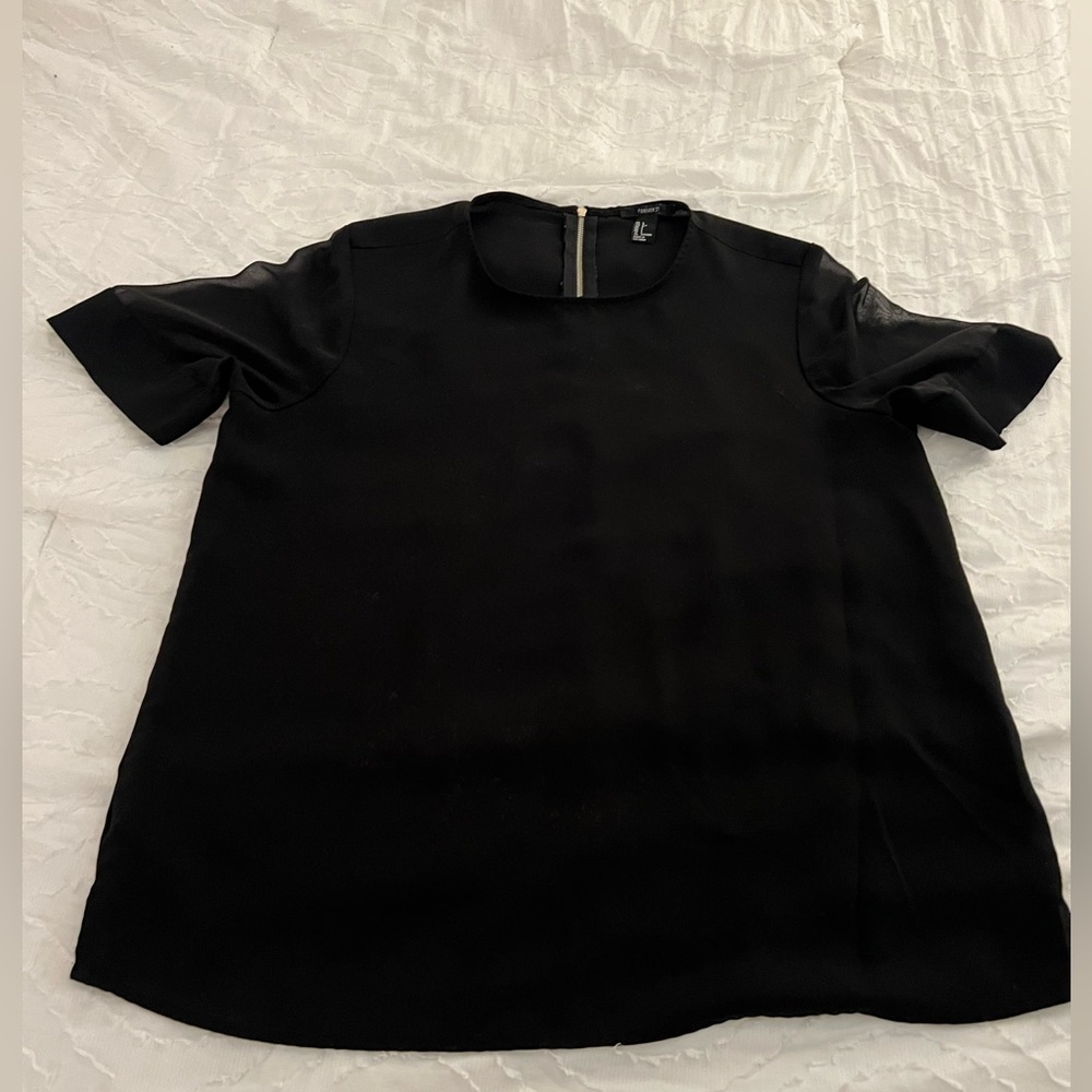 Woman’s Forever21 shirt